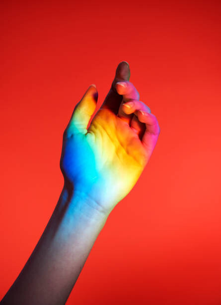 Obraz na płótnie hand with rainbow colours