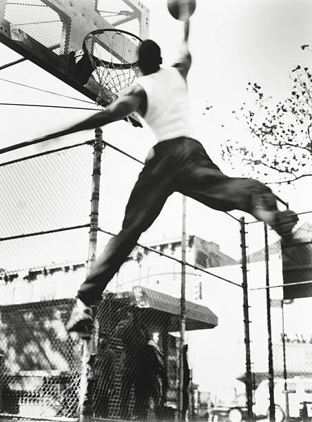 Obraz na płótnie Man playing basketball, low angle view