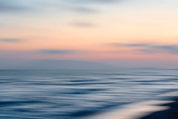 Obraz na płótnie Panning on seascape at sunset with