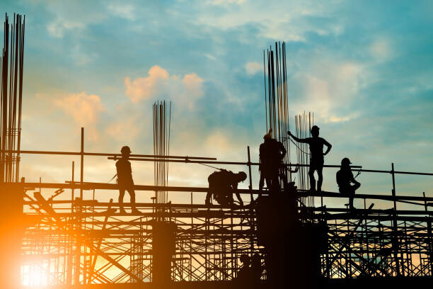 Obraz na płótnie Silhouette of engineer and construction team