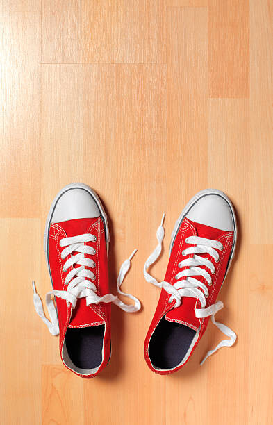 Obraz na płótnie Trainers on wooden floor