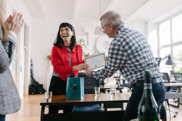 Poster Businesswoman Receiving Certificate At The Office