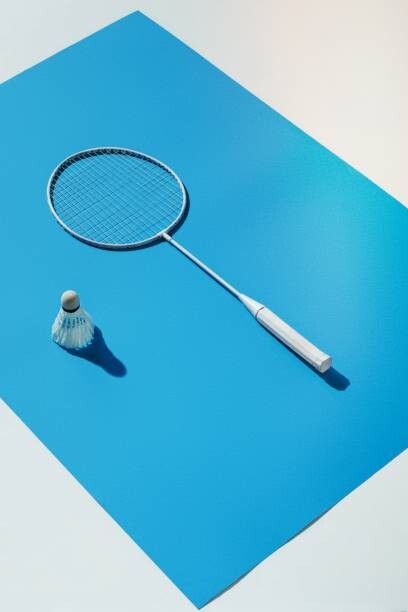 Poster High angle view of badminton racket on table