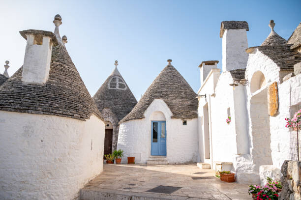 Poster Traditional Apulian Trulli houses. Apulia, Italy