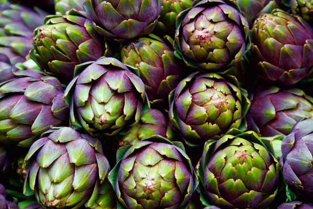 Póster full frame of purple italian artichokes