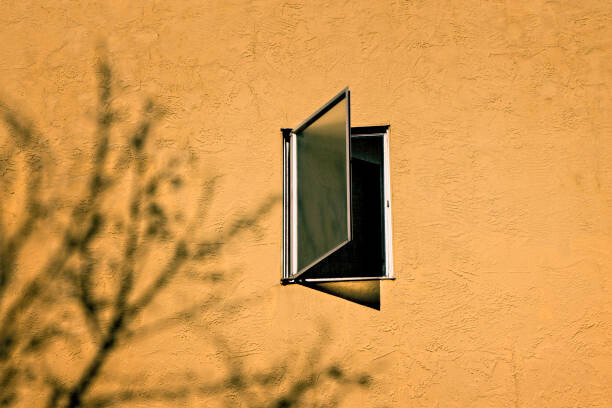 Poster Open window on a orange wall