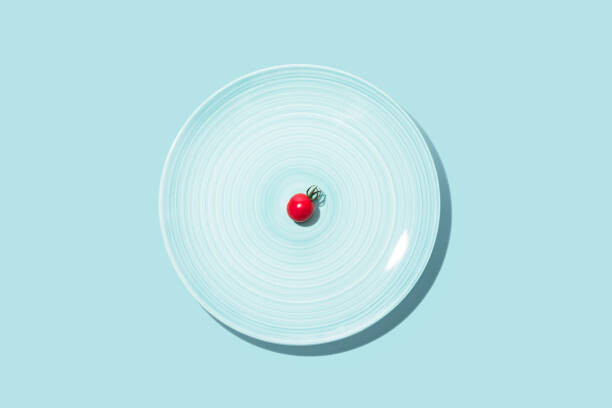 Poster Small Cherry Tomato With Big Blue Plate