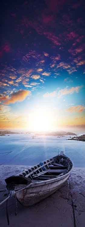 Skleněný Obraz Osamělá loďka na pláži