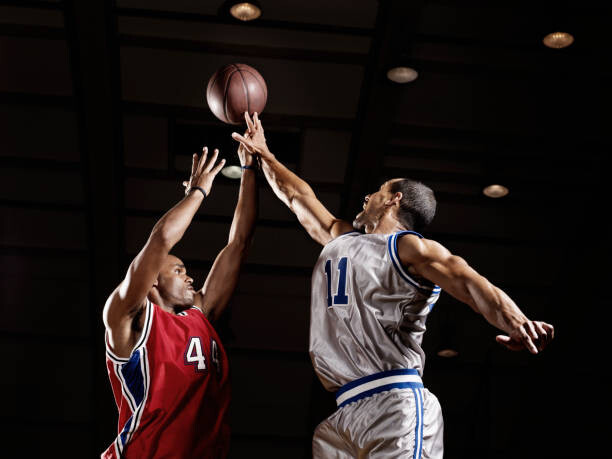 Tableau sur toile Basketball player trying to take basketball