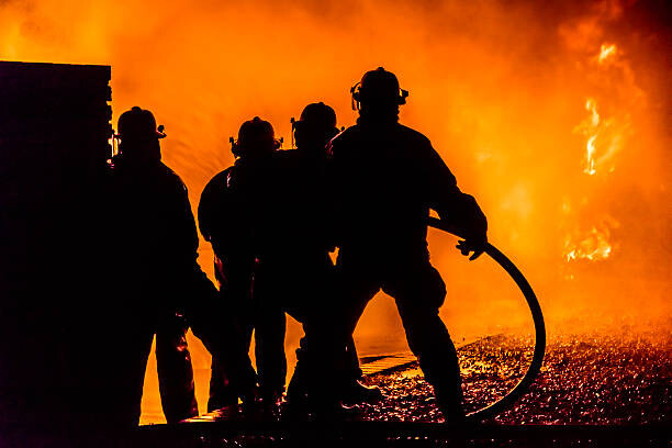Tableau sur toile Firefighters silhouette