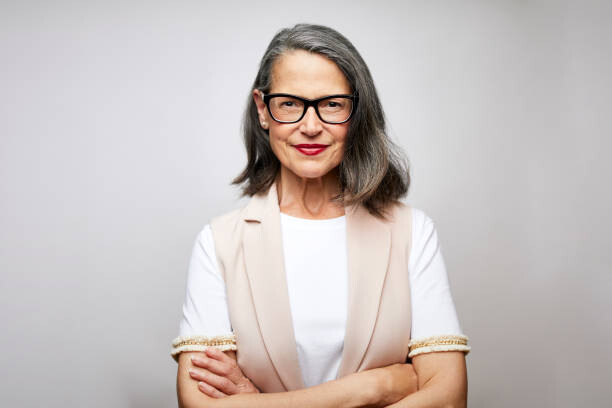 Tableau sur toile Mature female CEO with arms crossed