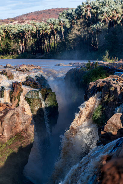 Tableau sur toile Scenic view of rocks in sea against sky,Namibia