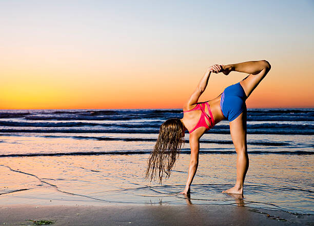 Tableau sur toile Yoga Pose at the Beach