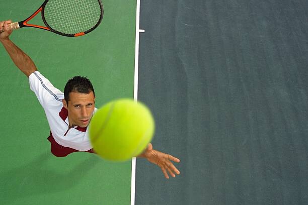 Samolepka Top View of Male Tennis Player Mid-Serve