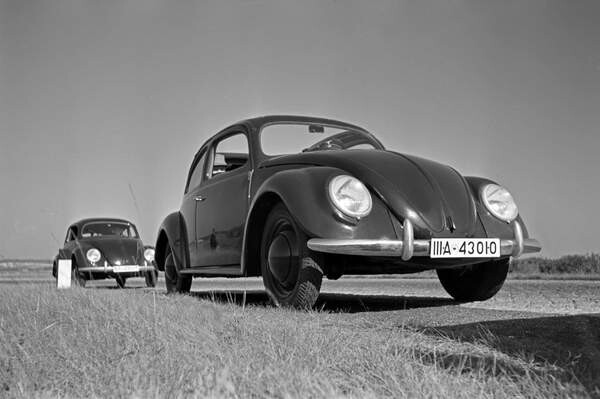 Samolepka Two models of the Volkswagen beetle, or KdF car, with open and closed roof near the test track near Wolfsburg, Germany 1930s