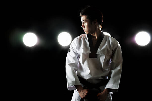 Samolepka young man training,taekwondo