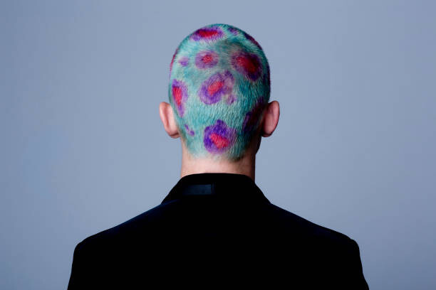 Autocolant Young man with dyed shot hair studio