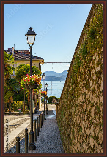 Photos A cozy old street in the town of Baveno on Lake Maggiore in Italy The silhouette
